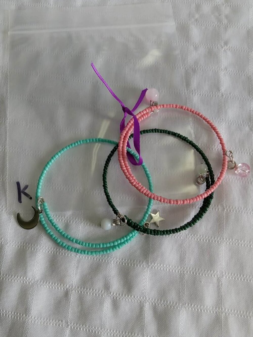K- Handmade memory wire bracelets set with beads and pendants
